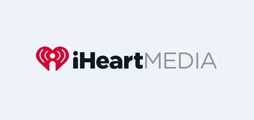 A logo for iheartmedia, which is currently in the process of being sold.