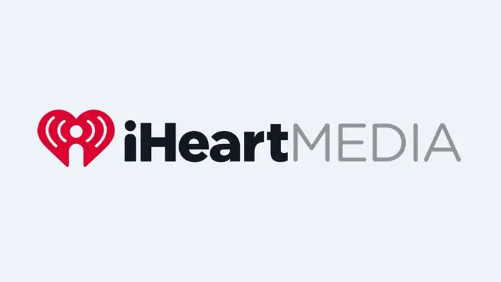 A white background with the words iheart media in black.