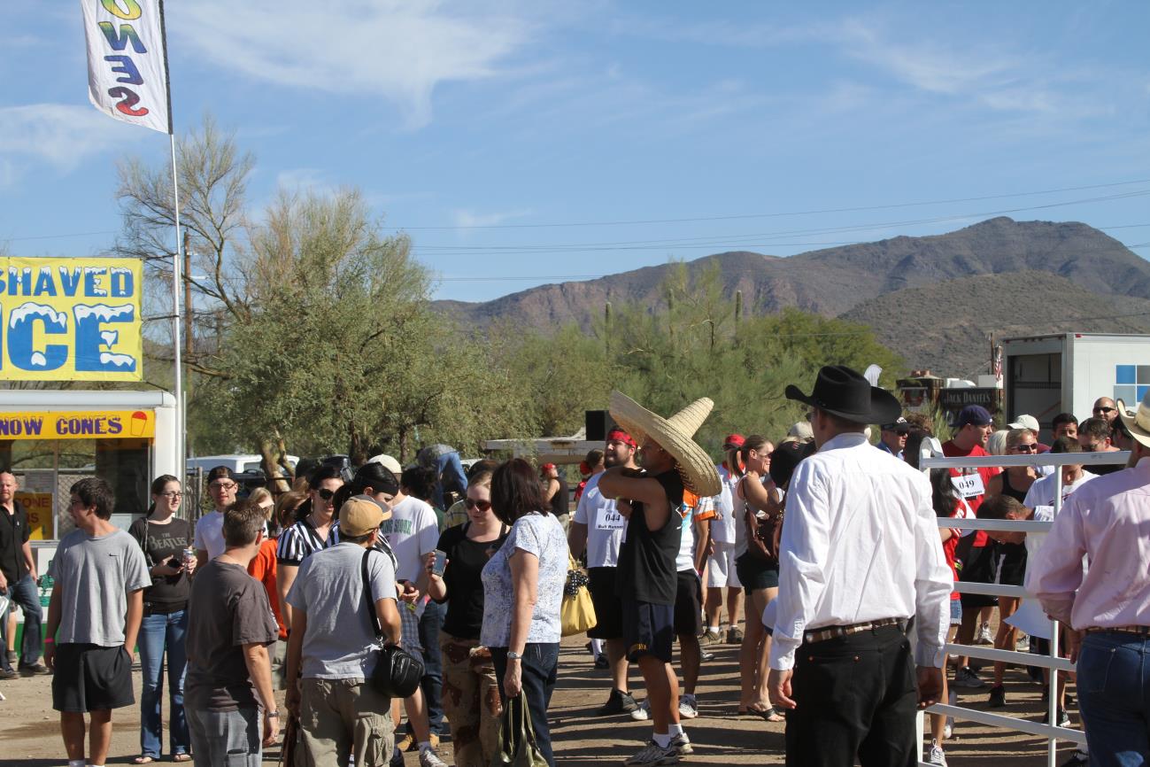 A large group of people walking down the street.