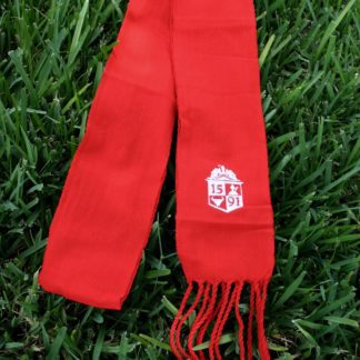 A red scarf with the university of utah logo on it.